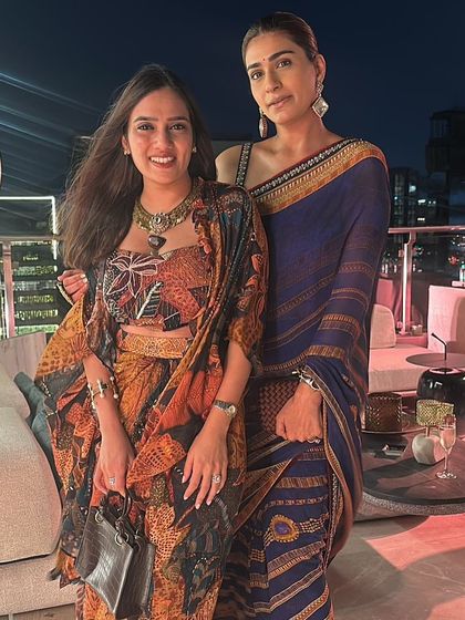 Posing with a client in one of my favorite Tarun Tahiliani sarees. The deep blue and classic print make it a versatile piece for any wedding event.