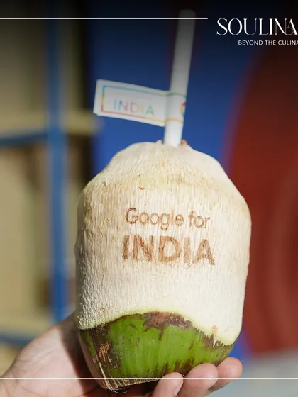 A refreshing and sustainable welcome drink: coconut water served in its natural shell, custom-branded for the Google for India event.