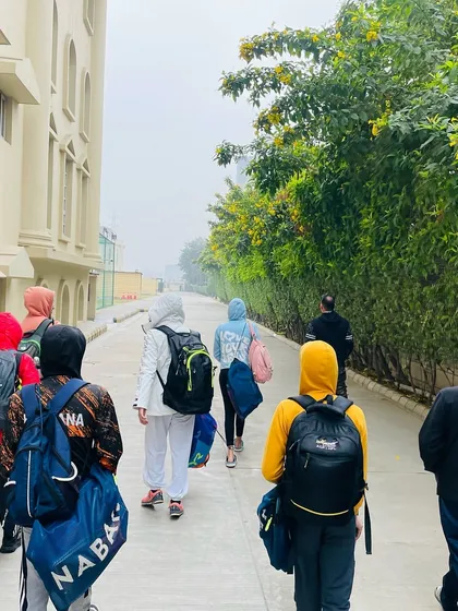 The team heading to a training session. My philosophy is to train smart, not just hard, ensuring every practice is productive and moves us closer to our goals.