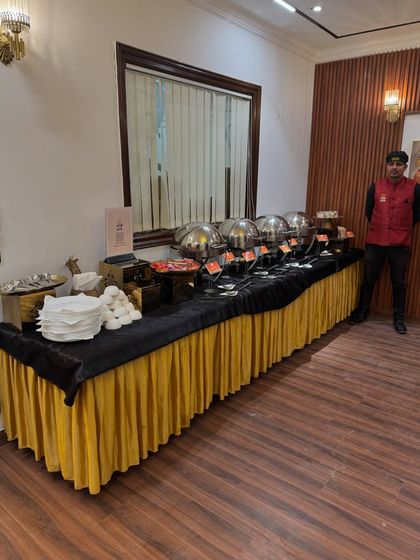 A full buffet line ready for service. Our team ensures the setup is clean, organized, and fully stocked before your guests arrive.