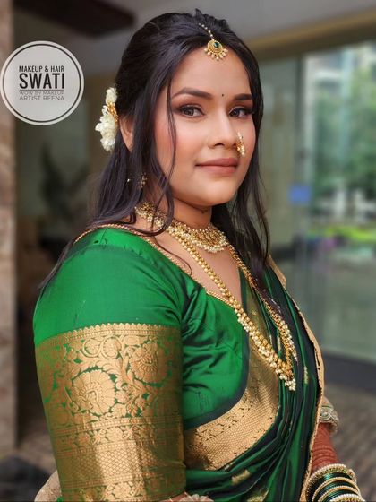 An engagement makeover by my artist Swati. This look features a classic green saree, traditional gold jewellery, and soft, glowing makeup.