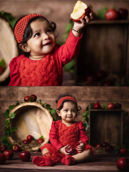 A collage from an apple-themed baby shoot. The top image shows the baby girl reaching for an apple, while the bottom shows her sitting happily amongst them.