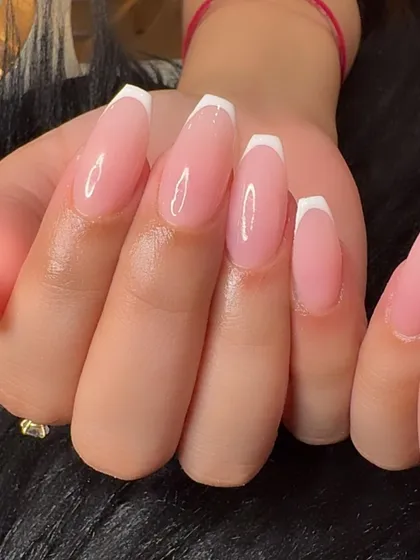 Another close-up of the clean and crisp lines of a classic French manicure.