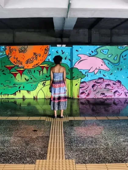 Standing in front of the massive mural I created for the Mumbai Metro. Projects like these are about more than just beautification; they are about bringing art to thousands of daily commuters, turning a mundane journey into a moment of curiosity and wonder. This is public art that becomes part of the city's story.