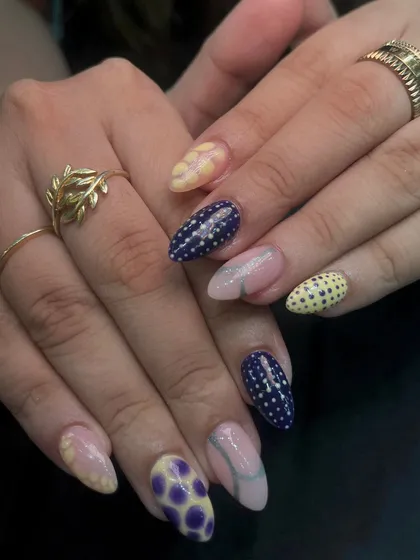A fun and quirky set with a mix of polka dots and abstract patterns in a unique color combination of yellow and blue.