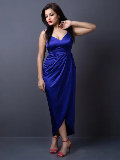 Confidence is the real sensuality. This is a shot from a portfolio shoot, where we created a bold and beautiful look with a classic red lip and smoky eye.