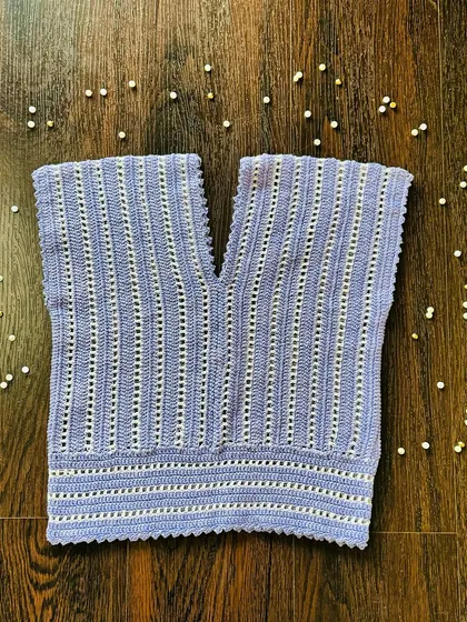 My new lavender and cream V-neck top. The vertical stitch pattern is designed to be flattering, and the scalloped edges add a soft, finished detail to the hem and neckline.