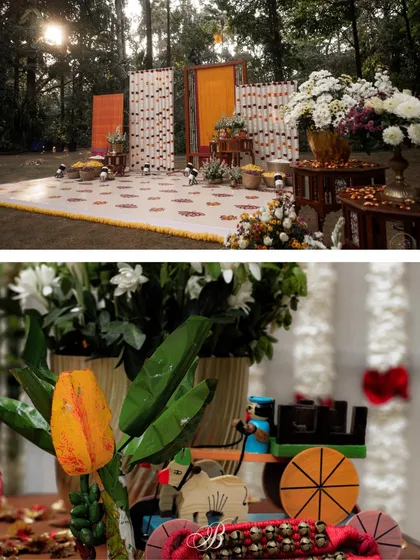 This stage backdrop was a masterpiece of personalization and upcycling. We used two of the bride's mother's treasured sarees as the base, pairing them with her favorite tiger chairs and a collection of local Channapatna crafts.