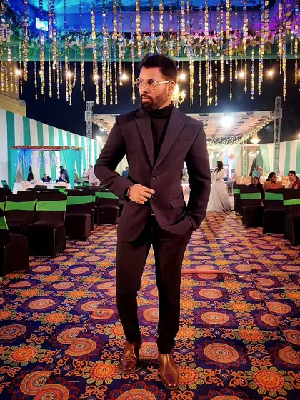 A formal look for a wedding reception. I'm comfortable in a full suit and tie, ensuring I present a professional image for high-end corporate and wedding events.