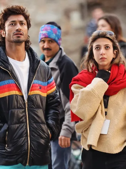A candid moment on the cold outdoor set of "Crakk" in Poland with Vidyut Jammwal. My focus here is always on the character's wardrobe, like his striped puffer jacket, while also managing the practicalities of a demanding shoot.