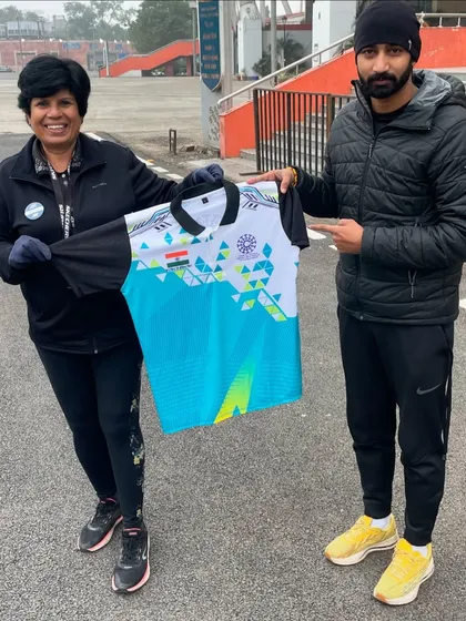 With Asian Marathon Champion Dr. Sunita Godara, holding up the official jersey of the TFCI CSR Initiative. I am proud to be a coach supported by this program.