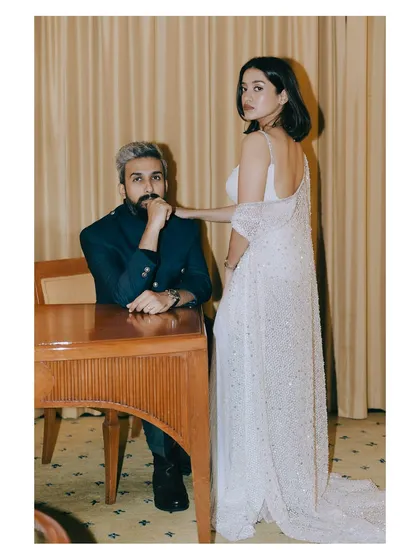 This portrait has a modern, editorial feel, capturing a couple with undeniable style. The bride, a makeup artist herself, turned her own look into a work of art. I thrive on collaborating with creative couples to produce striking, high-fashion wedding portraits.