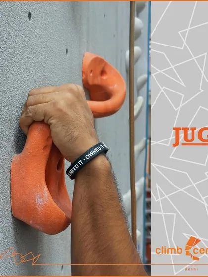 This is a 'jug' hold. It's big, easy to grab, and perfect for beginners or for taking a rest mid-route to shake out your arms.