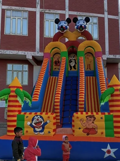 This is a popular 3-lane bouncy slide with Chhota Bheem and Doraemon characters. It's great for parties with lots of kids so no one has to wait long for their turn.