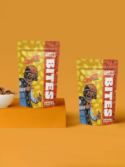A clean, minimalist shot of 'Snack King' snack packages. The color-blocked background and simple props keep the focus entirely on the product's branding.