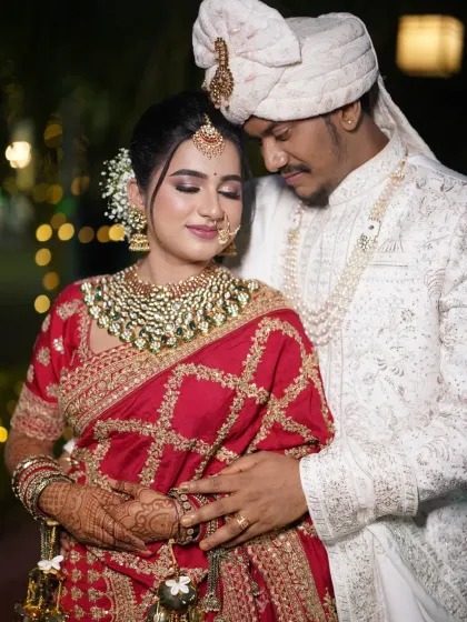 A romantic portrait of the North Indian bride with her groom.