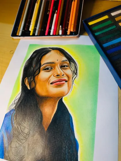 A slightly different angle of the finished portrait, showcasing the smooth texture of the 200gsm Brustro paper and the vibrant colors.