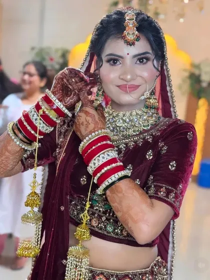 Your mehndi is a key part of your bridal look. Here, you can see how the deep, rich color of my organic henna beautifully complements the bride's stunning wedding lehenga and jewelry.