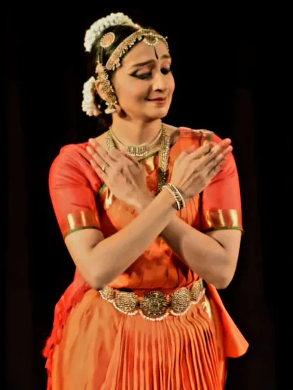 A close up capturing a moment of devotion and introspection during a solo performance. Conveying these deep emotions is at the heart of my abhinaya practice.