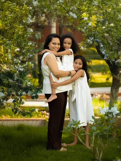 A beautiful, unscripted moment between a mother and her daughters. My goal is to capture the real love and connection your family shares in a natural, outdoor setting.