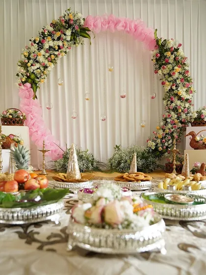 The arrangement of traditional offerings is an art in itself. We ensure every element on the stage is placed thoughtfully for both ritualistic significance and aesthetic appeal.