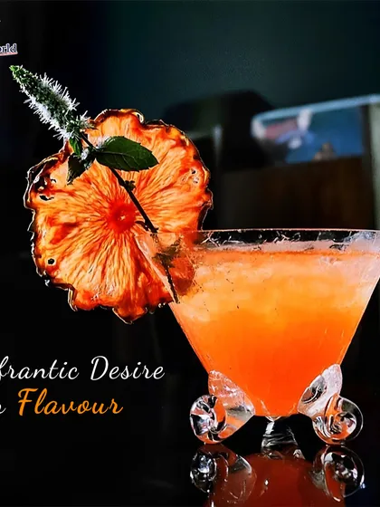 A frantic desire for flavor is what drives our creations. This unique cocktail, served in a wheeled glass and garnished with a dehydrated pineapple flower, is a testament to our innovative spirit.