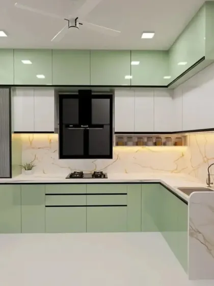 We offer a variety of color options for our modular kitchens. This render shows a lovely pastel green and white combination, perfect for a fresh and modern home.