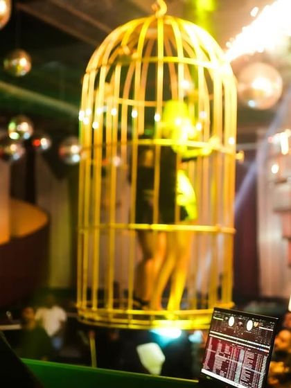 A view from my DJ booth, with performers and pyrotechnics creating a spectacular show for the audience. It's all about creating a multi-sensory experience.