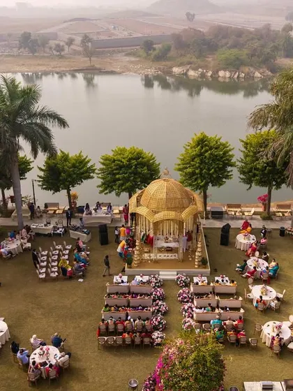 The wedding ceremony is the soul of the celebration. I designed this serene lakeside mandap at Shikarbadi Hotel, Udaipur, to create a tranquil and picturesque setting for the couple to exchange their sacred vows, surrounded by nature's beauty.