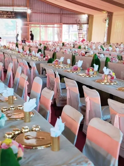 We specialize in grand, traditional seated dining. This extensive setup with golden thalis is from a beautiful Jain wedding, where we served hundreds of guests with care and precision.