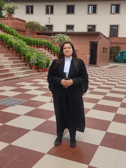 Posing in the courtyard of the Supreme Court. Every case I take on is a commitment to upholding the law.