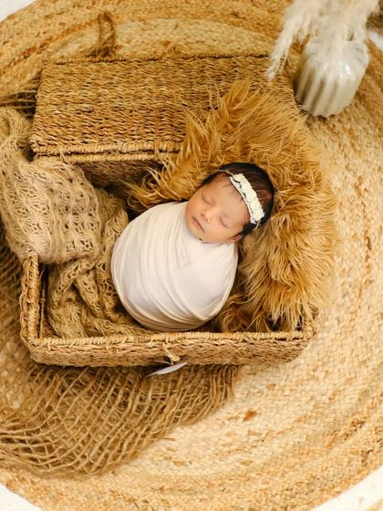 This sweet baby is sleeping in a little boho-themed basket. I love using natural materials like jute and wicker in my sessions.