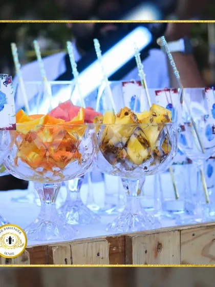 We believe in freshness. These glasses are filled with fresh-cut oranges and pineapples, ready to be turned into delicious, fruit-forward cocktails.