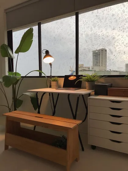 My workspace with some fun doodles on the window. Little creative touches make the studio feel more personal and inspiring.