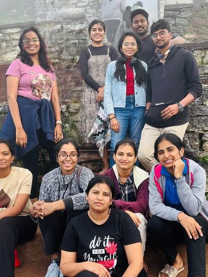 Our group taking a break on the steps of a viewpoint in Chikmagalur.