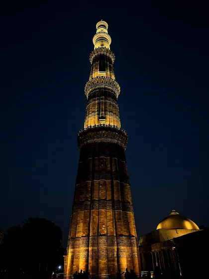 The magnificent Qutub Minar in Delhi, illuminated against the night sky. I specialize in capturing heritage monuments in different lighting conditions to showcase their timeless architectural brilliance and intricate details.