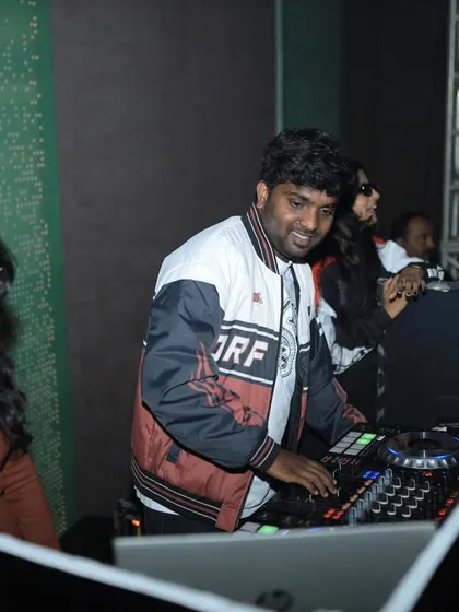 A candid moment behind the decks with guests enjoying the music. I love it when the crowd gets involved and feels the energy of the mix.