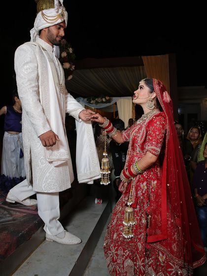 A lovely candid shot from the wedding ceremony. The makeup is set to be flawless and long-lasting through all the rituals and celebrations.