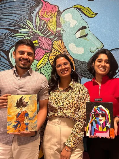 The results from a Valentine's Art Date session. One person painted Goku, the other painted a pop-art Taylor Swift. It's all about painting what you love!