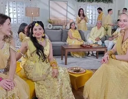 Another shot from the set, showing the actors in our yellow ethnic wear.