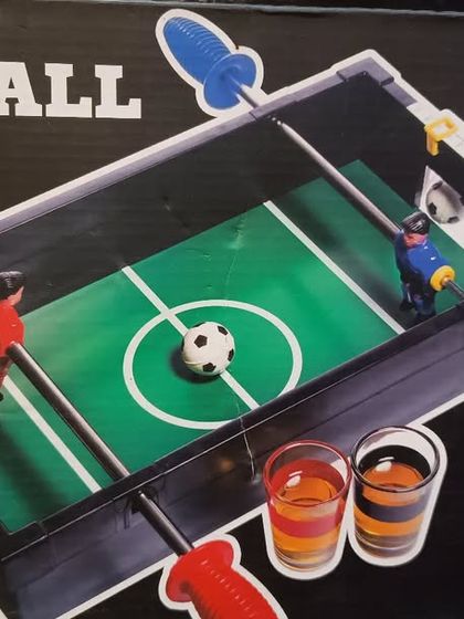A mini foosball game that also doubles as a drinking game. This is a fantastic and interactive game for any adult party or game night.