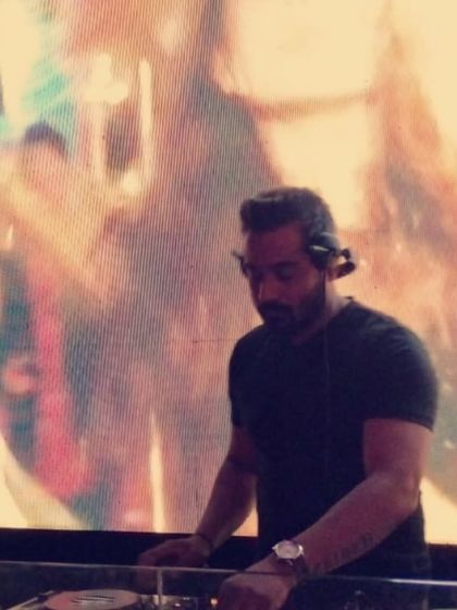 A sepia-toned shot from a club night, focused on the mix. Every set is a new opportunity, and I always bring my best.