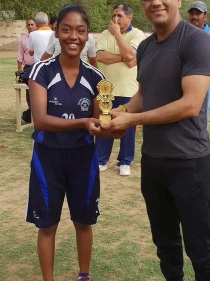 A promising young player from our academy receiving the "Future of the Basketball" award from a respected IAS Officer. Recognizing and encouraging potential is a key part of our youth development program.