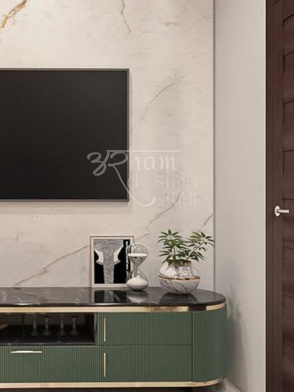 This detail shot shows the elegant TV console in the master bedroom. The fluted green cabinetry and marble-finish top connect with the room's overall color palette, creating a cohesive and stylish look.
