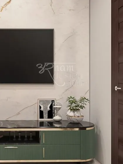 This detail shot shows the elegant TV console in the master bedroom. The fluted green cabinetry and marble-finish top connect with the room's overall color palette, creating a cohesive and stylish look.