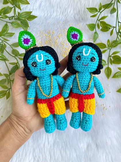 Two little Krishna dolls, side-by-side. They are one of my most popular designs and I love making them. Each one is handmade with love and is perfect for Janmashtami or as a gift for a loved one.