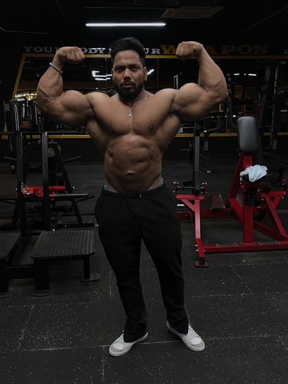 Front double bicep. This is what happens when you turn pain into power.