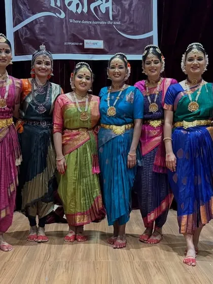 Post-performance scenes with my students after presenting "SHIVAKEERTHANAMALIKA". Their happy faces and beautiful costumes tell a story of success.