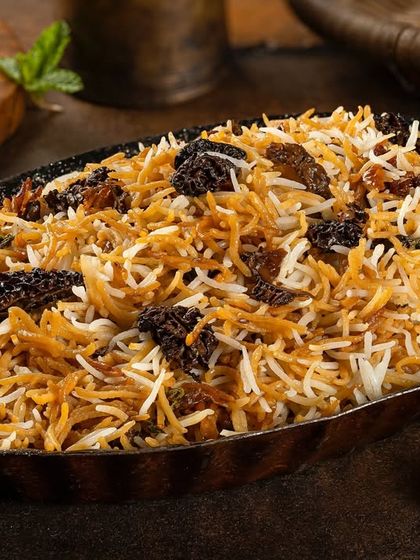 A unique Gucchi Pulao, made with rare morel mushrooms, photographed to look as exotic and premium as it tastes for Punjab Grill.