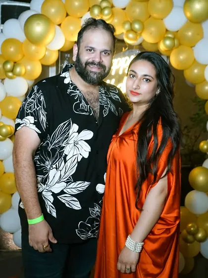 A happy couple enjoying a party. Our event photography includes capturing portraits of you and your loved ones celebrating together.